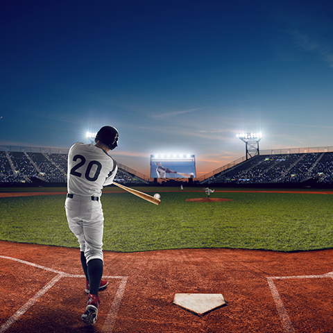 Baseball player swinging bat