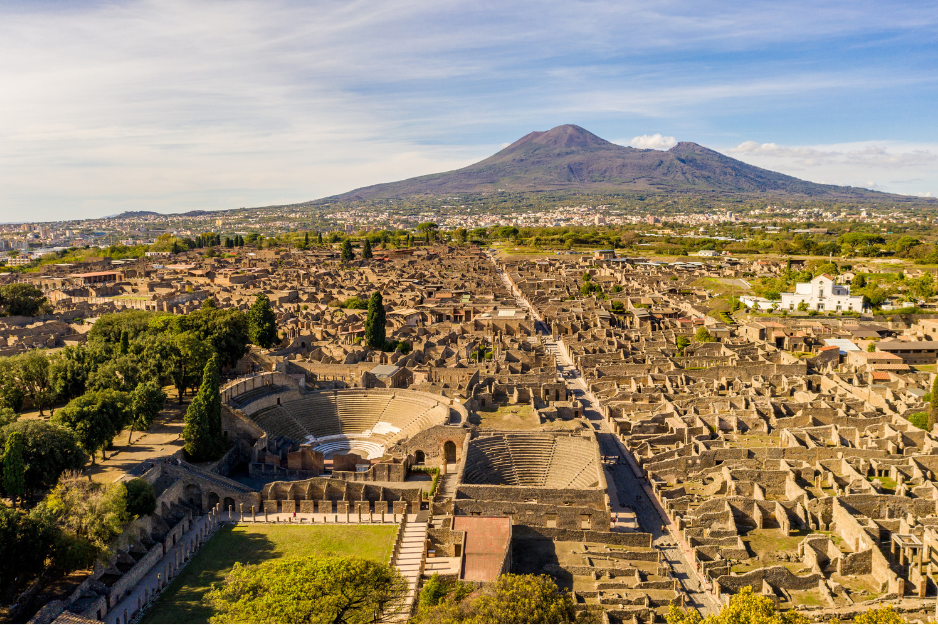 Aerial View Of Pompeii With Mount Vesuvius In The Background