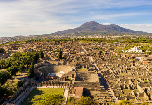 Aerial View Of Pompeii With Mount Vesuvius In The Background