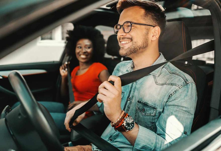 Couple in a rental vehicle