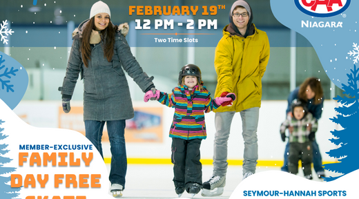 A family holding hands while ice skating together